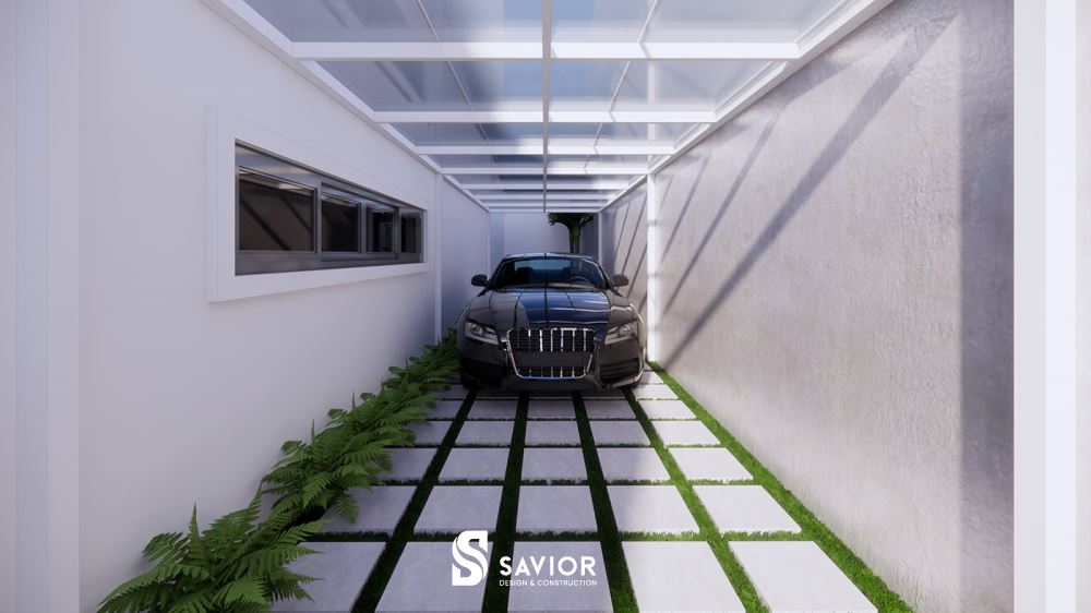 Khu vực hành lang bên cạnh ngôi nhà được tận dụng làm nơi để xe