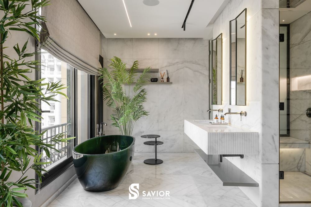 Không gian nhà tắm rộng rãi với tông màu trắng - xanh làm chủ đạo