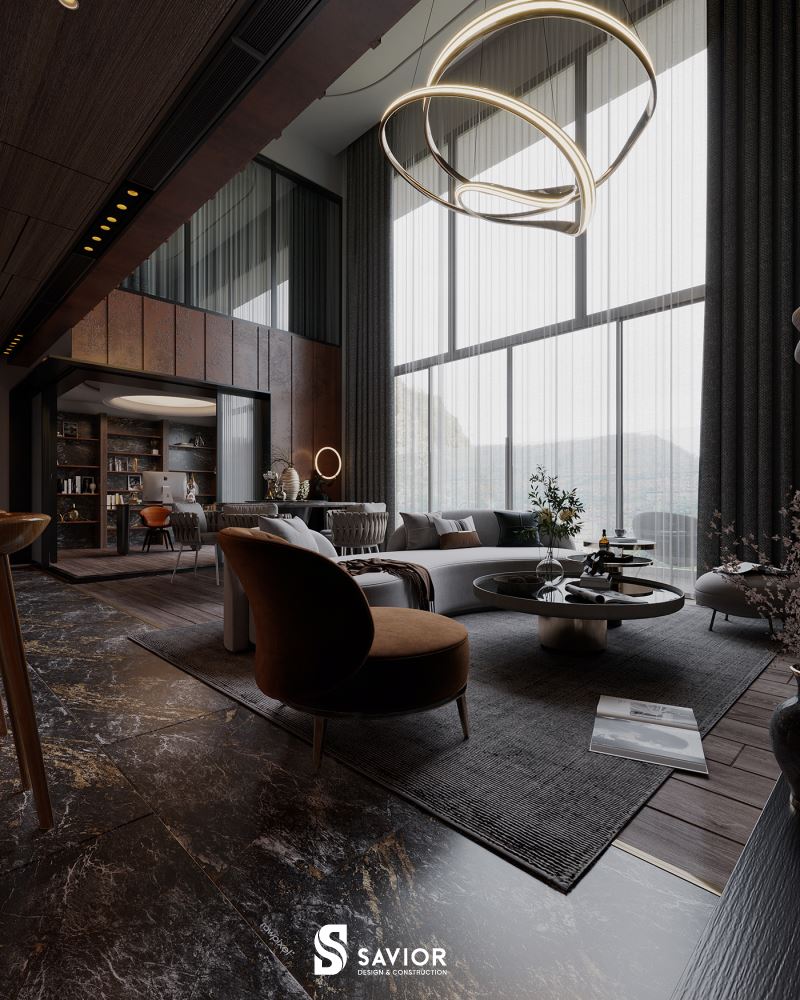 Phòng khách thiết kế thông tầng, hệ cửa sổ lớn sát mặt đất càng tăng thêm cảm giác cao rộng của căn hộ