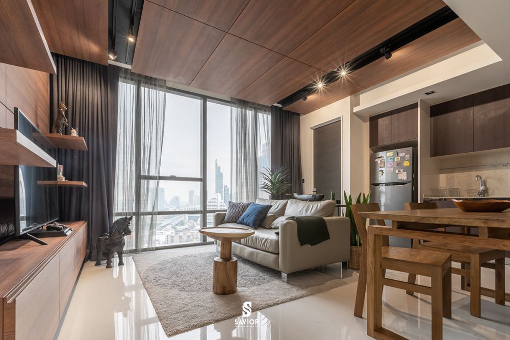 Nội thất phòng khách sử dụng chất liệu gỗ công nghiệp cùng tông màu nâu trầm