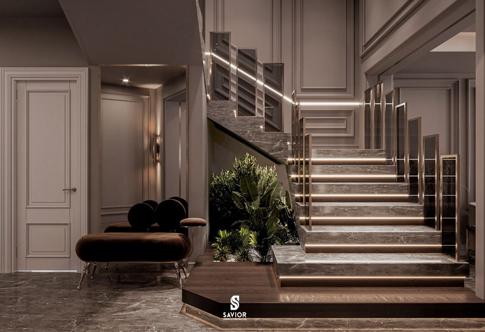 Cầu thang mặt đá kết hợp kính tạo sự hài hòa với phong cách thiết kế chung của biệt thự