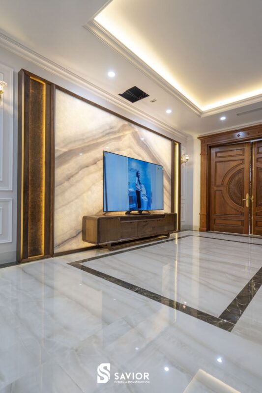 Thi công nội thất trọn gói tận tâm, giá trực tiếp tại nhà máy sản xuất 19 Vách ốp tivi sử dụng chất liệu đá marble kết hợp đèn Led lung linh