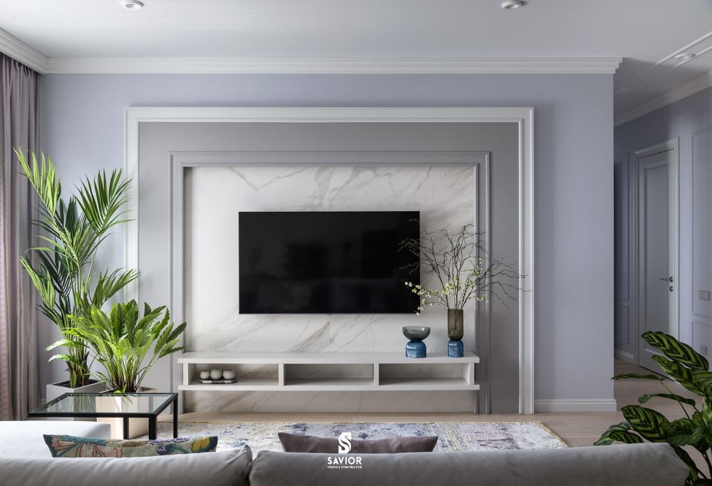 10+ Thiết kế thi công nội thất tại Bắc Ninh đẹp - ấn tượng 2 Phòng khách được trang trí thêm cây xanh hợp mệnh với gia chủ làm nổi bật không gian